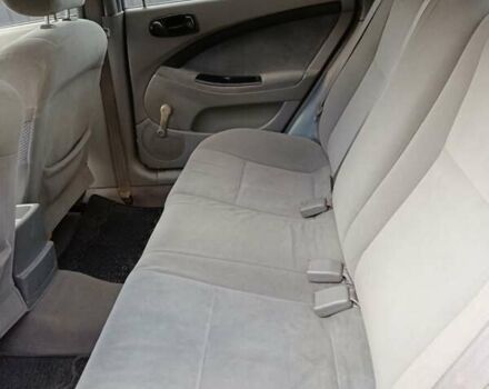 Красный Шевроле Лачетти, объемом двигателя 1.4 л и пробегом 252 тыс. км за 4000 $, фото 2 на Automoto.ua