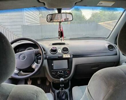 Красный Шевроле Лачетти, объемом двигателя 1.4 л и пробегом 252 тыс. км за 4000 $, фото 5 на Automoto.ua