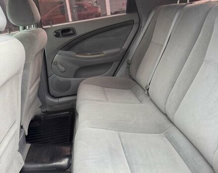 Красный Шевроле Лачетти, объемом двигателя 1.4 л и пробегом 160 тыс. км за 4450 $, фото 9 на Automoto.ua