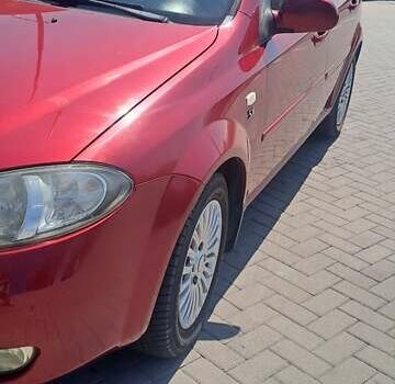 Красный Шевроле Лачетти, объемом двигателя 1.8 л и пробегом 280 тыс. км за 5700 $, фото 3 на Automoto.ua