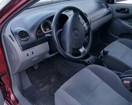 Красный Шевроле Лачетти, объемом двигателя 1.6 л и пробегом 53 тыс. км за 6000 $, фото 4 на Automoto.ua