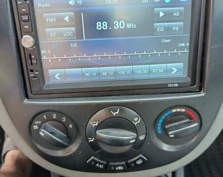 Красный Шевроле Лачетти, объемом двигателя 1.4 л и пробегом 252 тыс. км за 4000 $, фото 3 на Automoto.ua