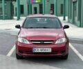 Красный Шевроле Лачетти, объемом двигателя 1.6 л и пробегом 237 тыс. км за 3999 $, фото 1 на Automoto.ua