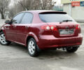 Красный Шевроле Лачетти, объемом двигателя 1.6 л и пробегом 184 тыс. км за 5499 $, фото 3 на Automoto.ua