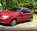 Червоний Шевроле Лачетті, об'ємом двигуна 1.8 л та пробігом 295 тис. км за 2999 $, фото 1 на Automoto.ua