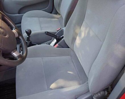 Красный Шевроле Лачетти, объемом двигателя 1.4 л и пробегом 107 тыс. км за 5200 $, фото 13 на Automoto.ua