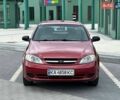 Красный Шевроле Лачетти, объемом двигателя 1.6 л и пробегом 237 тыс. км за 3999 $, фото 1 на Automoto.ua