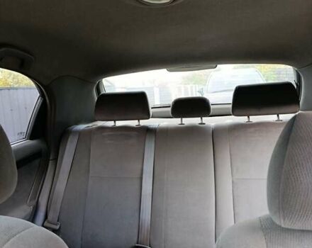 Красный Шевроле Лачетти, объемом двигателя 1.4 л и пробегом 252 тыс. км за 4000 $, фото 4 на Automoto.ua