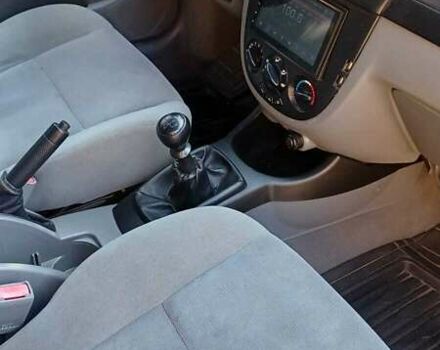 Красный Шевроле Лачетти, объемом двигателя 1.4 л и пробегом 107 тыс. км за 5200 $, фото 4 на Automoto.ua