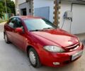 Красный Шевроле Лачетти, объемом двигателя 1.6 л и пробегом 236 тыс. км за 2900 $, фото 1 на Automoto.ua