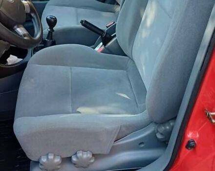 Красный Шевроле Лачетти, объемом двигателя 1.4 л и пробегом 107 тыс. км за 5200 $, фото 11 на Automoto.ua