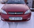 Красный Шевроле Лачетти, объемом двигателя 1.6 л и пробегом 53 тыс. км за 6000 $, фото 1 на Automoto.ua