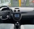 Красный Шевроле Лачетти, объемом двигателя 1.4 л и пробегом 252 тыс. км за 4400 $, фото 8 на Automoto.ua