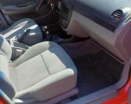 Красный Шевроле Лачетти, объемом двигателя 1.4 л и пробегом 107 тыс. км за 5200 $, фото 15 на Automoto.ua