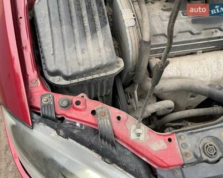 Красный Шевроле Лачетти, объемом двигателя 1.8 л и пробегом 121 тыс. км за 3750 $, фото 8 на Automoto.ua