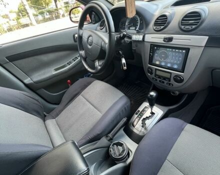 Красный Шевроле Лачетти, объемом двигателя 1.8 л и пробегом 250 тыс. км за 4000 $, фото 7 на Automoto.ua