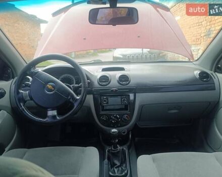 Красный Шевроле Лачетти, объемом двигателя 1.6 л и пробегом 261 тыс. км за 3650 $, фото 24 на Automoto.ua