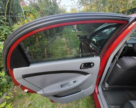 Красный Шевроле Лачетти, объемом двигателя 1.8 л и пробегом 110 тыс. км за 4600 $, фото 21 на Automoto.ua