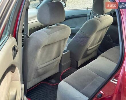 Красный Шевроле Лачетти, объемом двигателя 1.4 л и пробегом 200 тыс. км за 3200 $, фото 5 на Automoto.ua