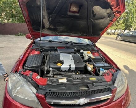 Красный Шевроле Лачетти, объемом двигателя 1.8 л и пробегом 250 тыс. км за 4000 $, фото 10 на Automoto.ua