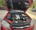 Красный Шевроле Лачетти, объемом двигателя 1.8 л и пробегом 250 тыс. км за 4000 $, фото 10 на Automoto.ua