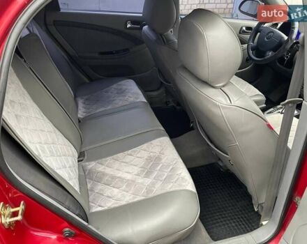 Красный Шевроле Лачетти, объемом двигателя 1.8 л и пробегом 121 тыс. км за 3750 $, фото 32 на Automoto.ua