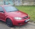 Красный Шевроле Лачетти, объемом двигателя 1.4 л и пробегом 259 тыс. км за 3500 $, фото 1 на Automoto.ua
