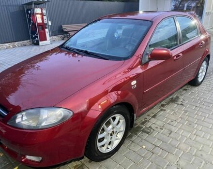 Красный Шевроле Лачетти, объемом двигателя 1.8 л и пробегом 250 тыс. км за 4000 $, фото 1 на Automoto.ua