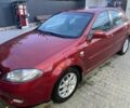 Красный Шевроле Лачетти, объемом двигателя 1.8 л и пробегом 250 тыс. км за 4000 $, фото 1 на Automoto.ua