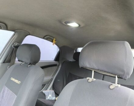 Красный Шевроле Лачетти, объемом двигателя 1.6 л и пробегом 300 тыс. км за 4200 $, фото 7 на Automoto.ua