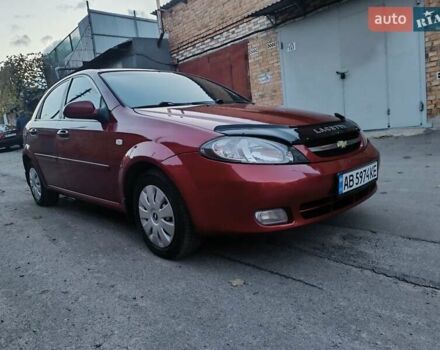 Красный Шевроле Лачетти, объемом двигателя 1.6 л и пробегом 261 тыс. км за 3650 $, фото 5 на Automoto.ua