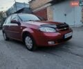 Красный Шевроле Лачетти, объемом двигателя 1.6 л и пробегом 261 тыс. км за 3650 $, фото 5 на Automoto.ua