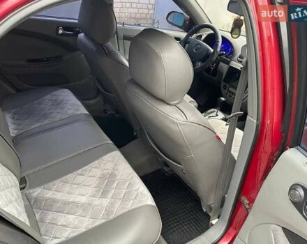 Красный Шевроле Лачетти, объемом двигателя 1.8 л и пробегом 121 тыс. км за 3750 $, фото 4 на Automoto.ua