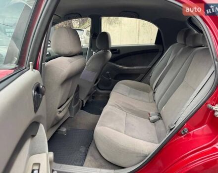 Червоний Шевроле Лачетті, об'ємом двигуна 1.4 л та пробігом 248 тис. км за 3600 $, фото 13 на Automoto.ua