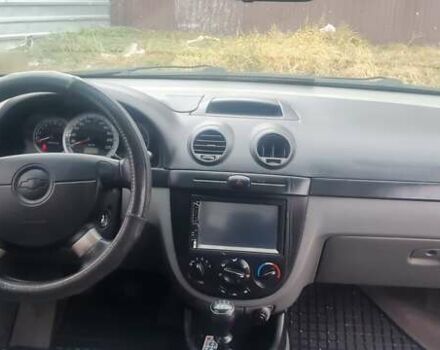 Красный Шевроле Лачетти, объемом двигателя 1.4 л и пробегом 259 тыс. км за 3500 $, фото 7 на Automoto.ua