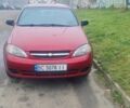 Красный Шевроле Лачетти, объемом двигателя 1.4 л и пробегом 259 тыс. км за 3500 $, фото 14 на Automoto.ua