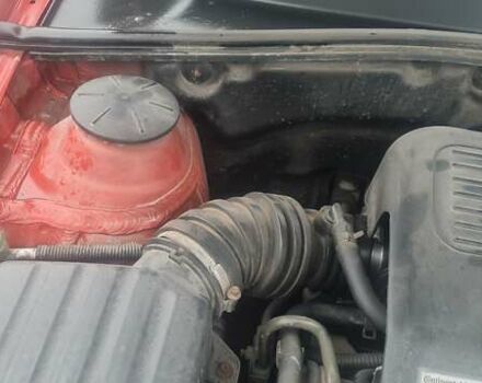 Красный Шевроле Лачетти, объемом двигателя 1.4 л и пробегом 259 тыс. км за 3500 $, фото 3 на Automoto.ua