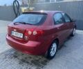 Красный Шевроле Лачетти, объемом двигателя 1.8 л и пробегом 250 тыс. км за 4000 $, фото 2 на Automoto.ua