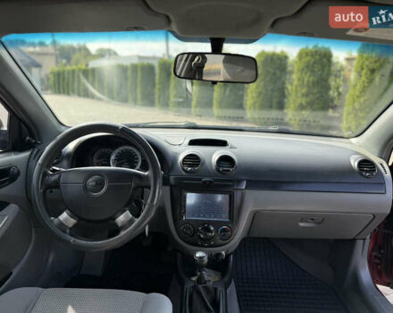 Красный Шевроле Лачетти, объемом двигателя 1.4 л и пробегом 258 тыс. км за 3300 $, фото 21 на Automoto.ua