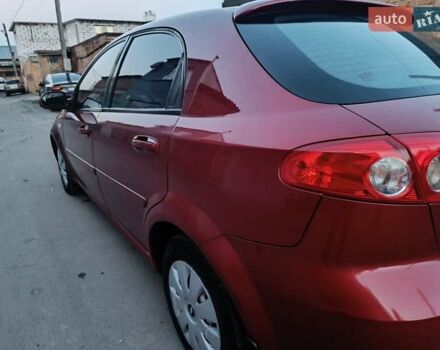 Красный Шевроле Лачетти, объемом двигателя 1.6 л и пробегом 261 тыс. км за 3650 $, фото 1 на Automoto.ua