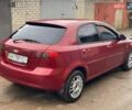 Красный Шевроле Лачетти, объемом двигателя 1.8 л и пробегом 121 тыс. км за 3750 $, фото 22 на Automoto.ua
