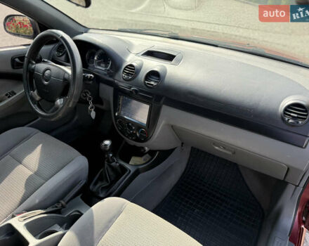 Красный Шевроле Лачетти, объемом двигателя 1.4 л и пробегом 258 тыс. км за 3300 $, фото 19 на Automoto.ua