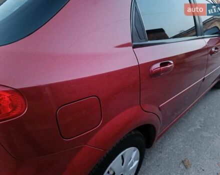 Красный Шевроле Лачетти, объемом двигателя 1.6 л и пробегом 261 тыс. км за 3650 $, фото 11 на Automoto.ua