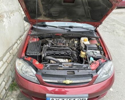Красный Шевроле Лачетти, объемом двигателя 1.6 л и пробегом 300 тыс. км за 4200 $, фото 5 на Automoto.ua