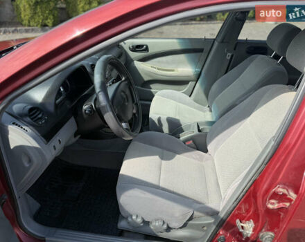 Красный Шевроле Лачетти, объемом двигателя 1.4 л и пробегом 258 тыс. км за 3300 $, фото 15 на Automoto.ua