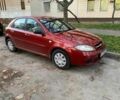 Красный Шевроле Лачетти, объемом двигателя 1.6 л и пробегом 250 тыс. км за 2489 $, фото 2 на Automoto.ua