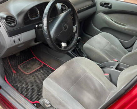 Красный Шевроле Лачетти, объемом двигателя 1.4 л и пробегом 200 тыс. км за 3200 $, фото 6 на Automoto.ua