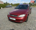Красный Шевроле Лачетти, объемом двигателя 1.4 л и пробегом 258 тыс. км за 3300 $, фото 1 на Automoto.ua