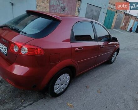 Красный Шевроле Лачетти, объемом двигателя 1.6 л и пробегом 261 тыс. км за 3650 $, фото 12 на Automoto.ua