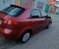 Красный Шевроле Лачетти, объемом двигателя 1.6 л и пробегом 261 тыс. км за 3650 $, фото 12 на Automoto.ua